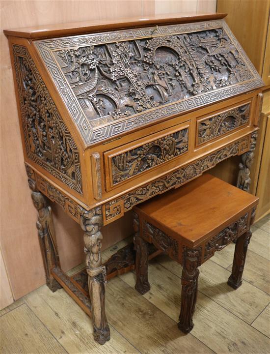 A Chinese camphorwood bureau and a stool, W.92cm